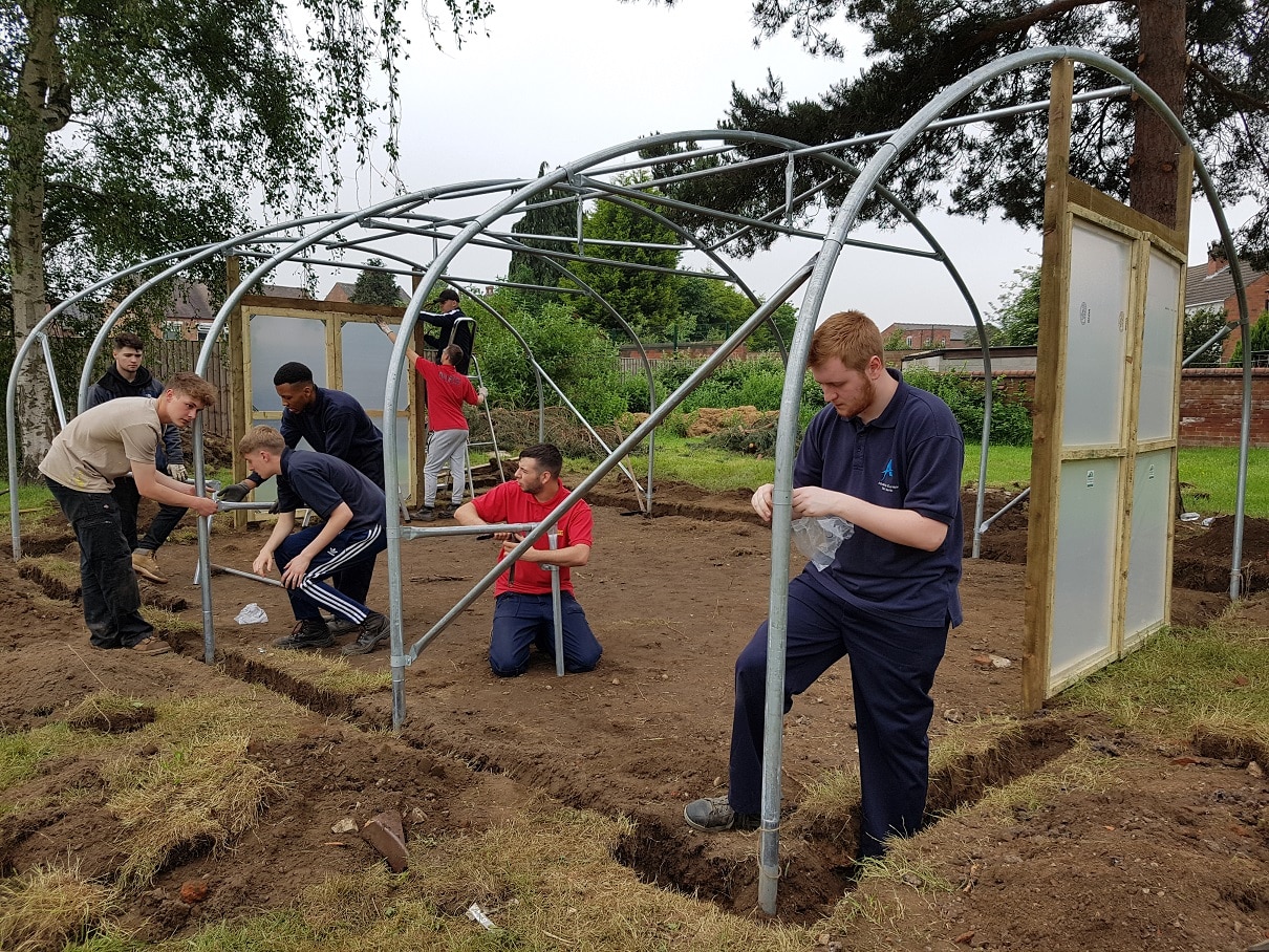 Toyota apprentices helped to create a garden at Kingsmead School. Penguin PR - public relations, media and communications