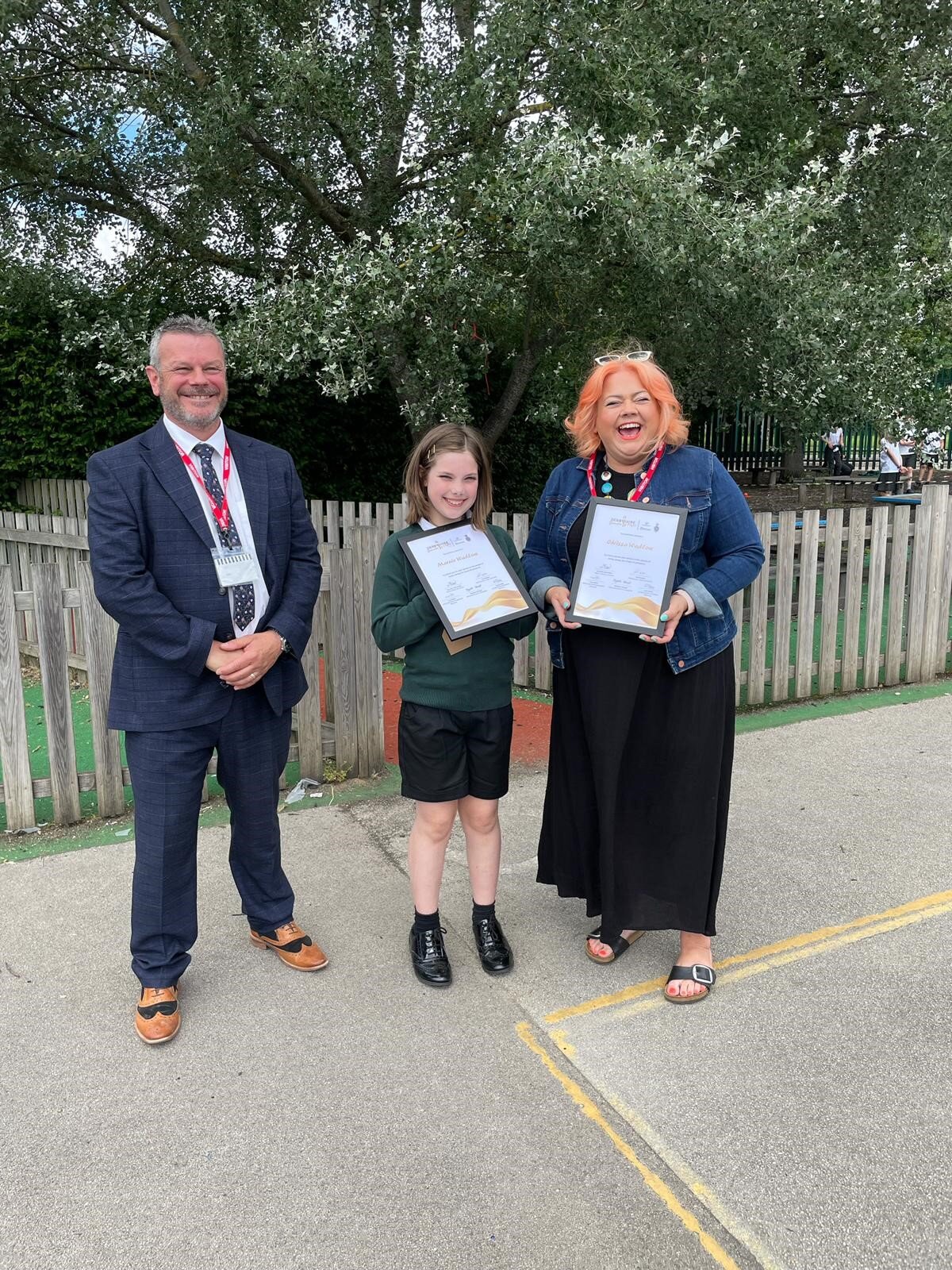 Derbyshire’s Deputy Lord Lieutenant stood with mum Terry McDermott and daughter Marnie Wadlow at award’s ceremony.