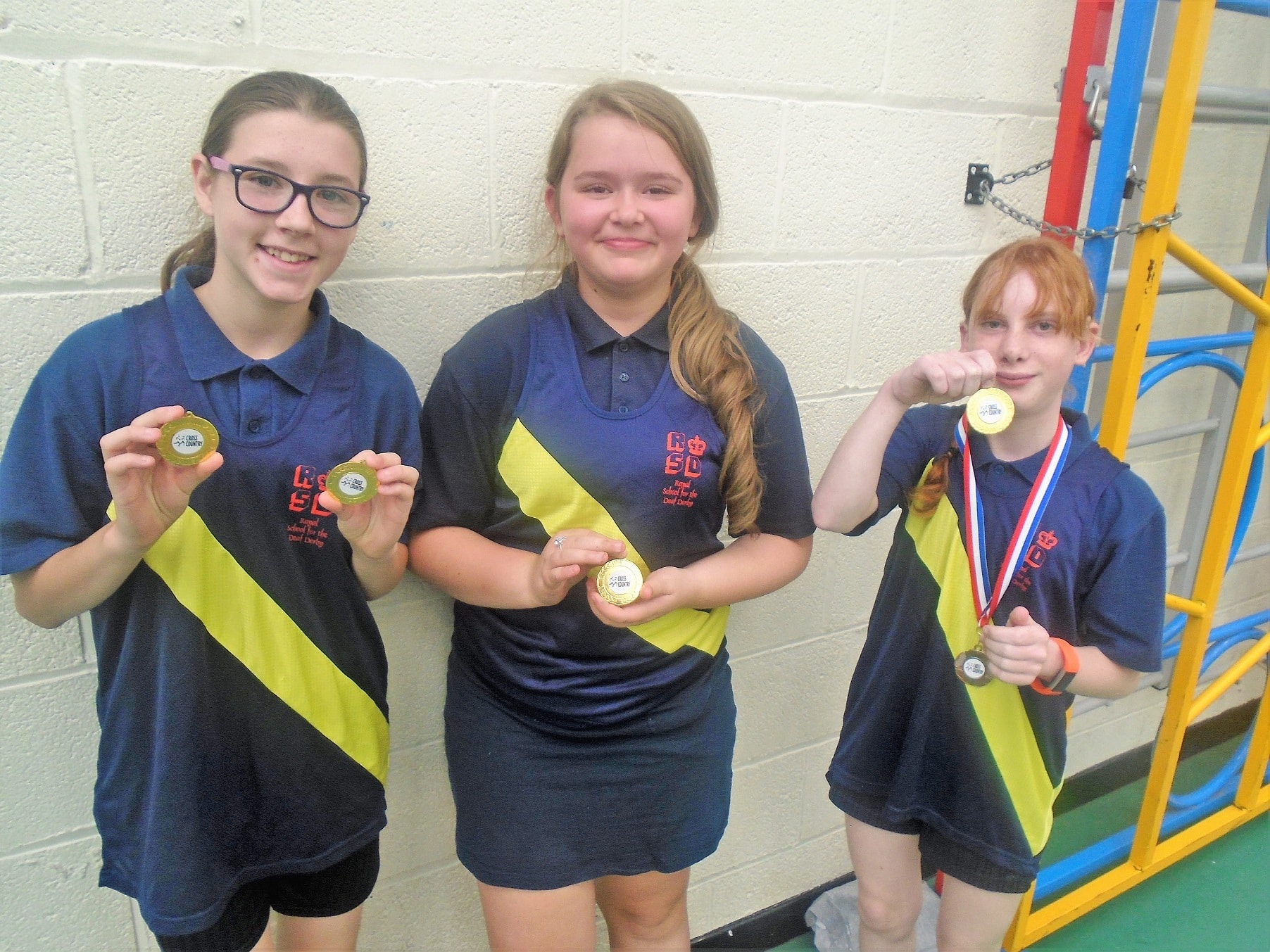 Pupils from The Royal School for the Deaf show off their medals. Penguin PR: public relations, media and communications