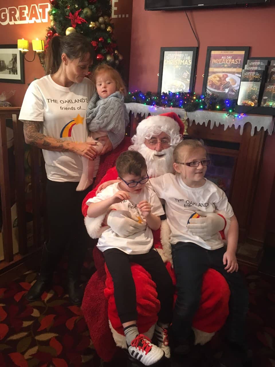 Anita Morrison (back row) was a part of the choir who signed White Christmas and Something Inside So Strong at The Oaklands pub, where over £6,500 was raised for St Giles School in Derby. Penguin PR: Public relations, media and communications