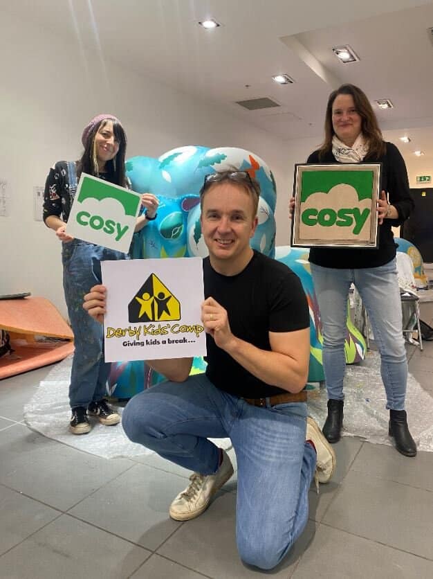 Cosy Direct CEO with the Ram which Duffield artists Lynne Hollingshurst has painted ahead of the Derby Rams Trail exhibition