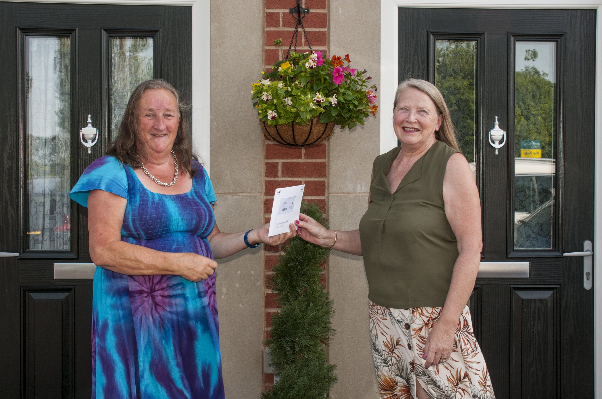 Deer Park neighbours Susan King and Pam Rogers  regularly chat over the fence of their brand-new home. Penguin PR: public relations, media and communications
