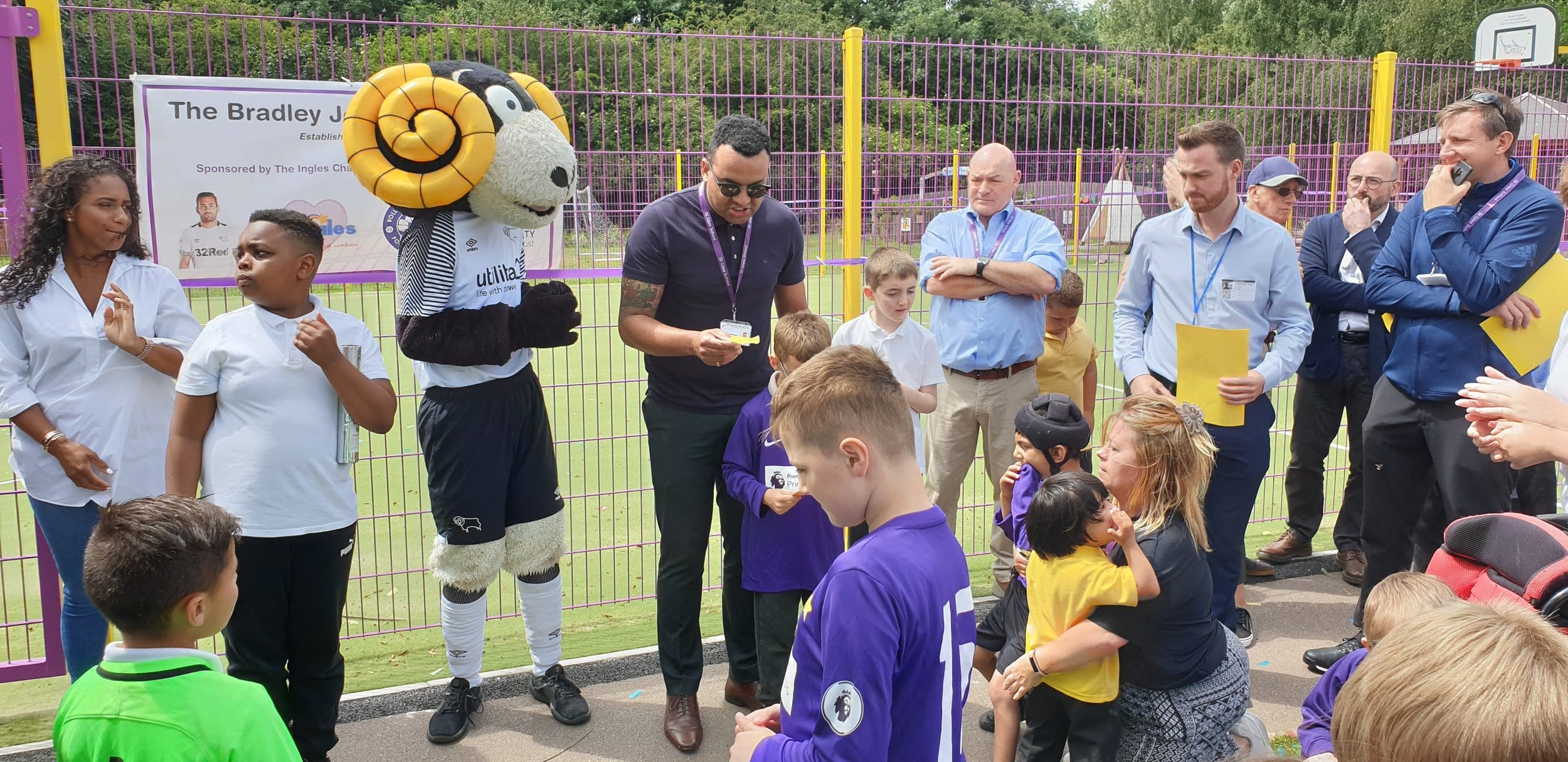 Derby County mascot Rammie with St Giles School executive head teacher Clive Lawrence at the opening of the MUGA.