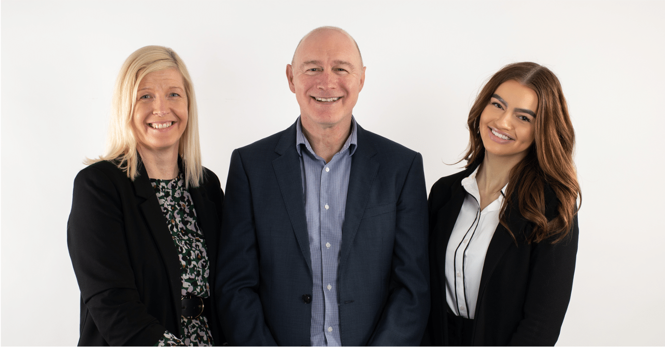 ActionCOACH owner Tony Prueitt with wife Vanessa (left) and daughter Fran.