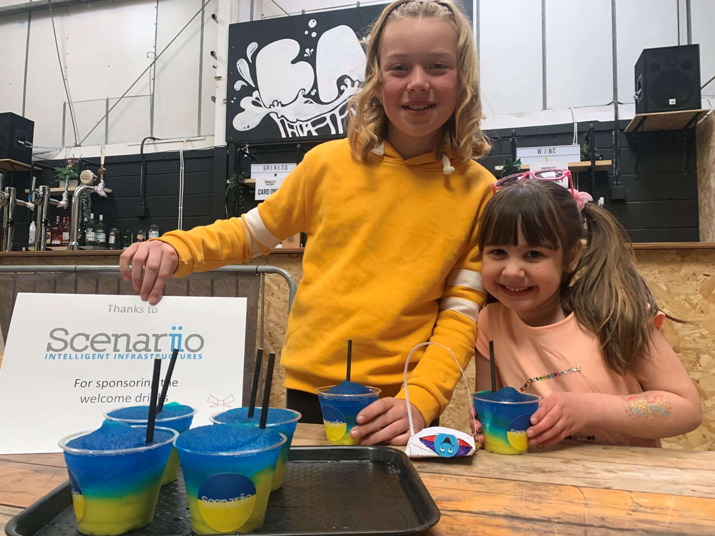 Ten-year-old Grace Ganly and Poppy Bamford with the special-edition slushies at Bustler, sponsored by Scenariio