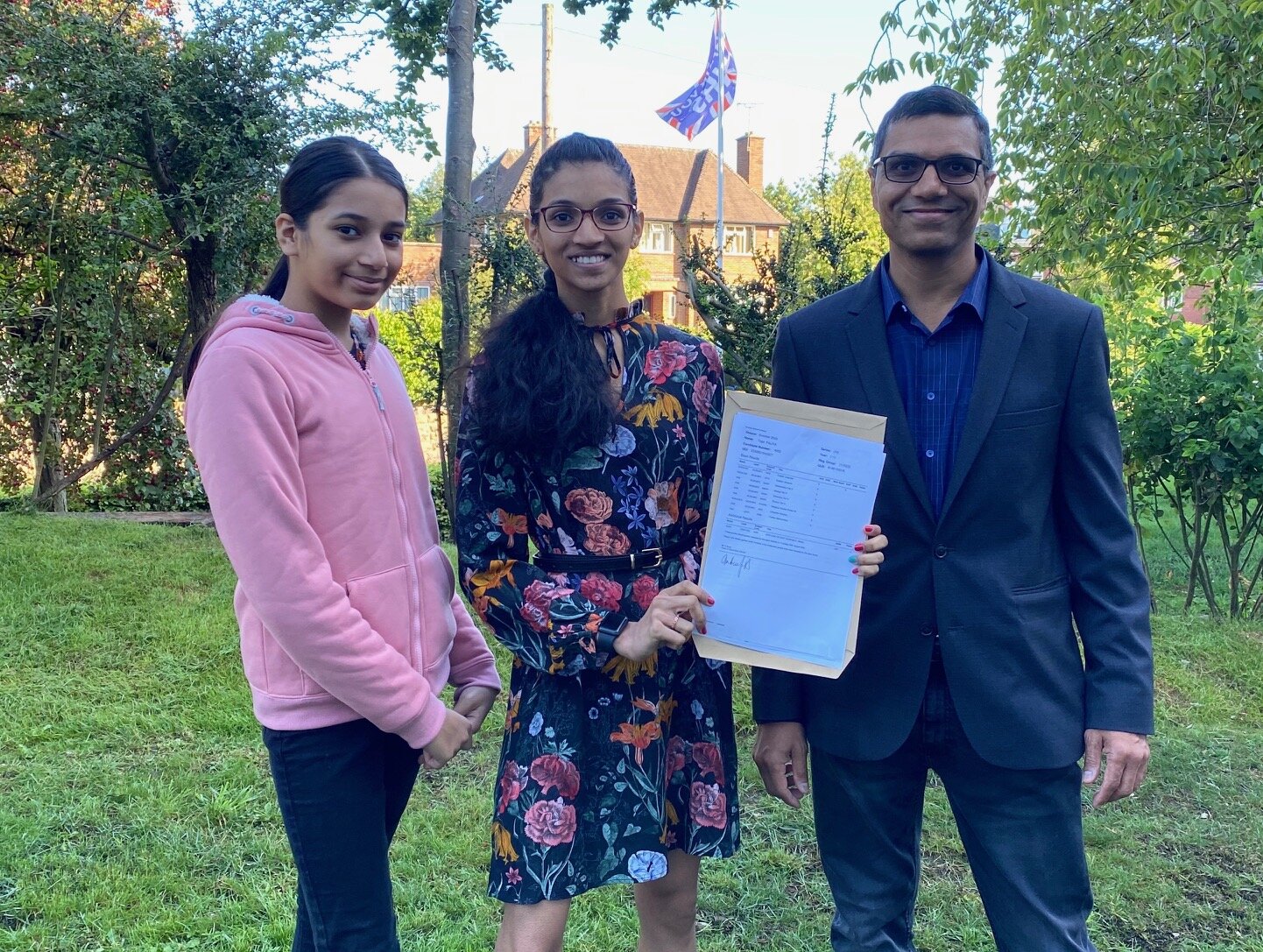 Tejal is pictured with her dad and younger sister.