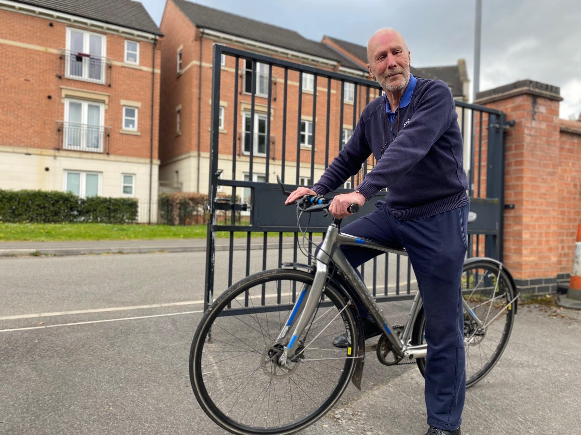 Bob Webb, 74, on his most recent bike that he uses to commute to work.