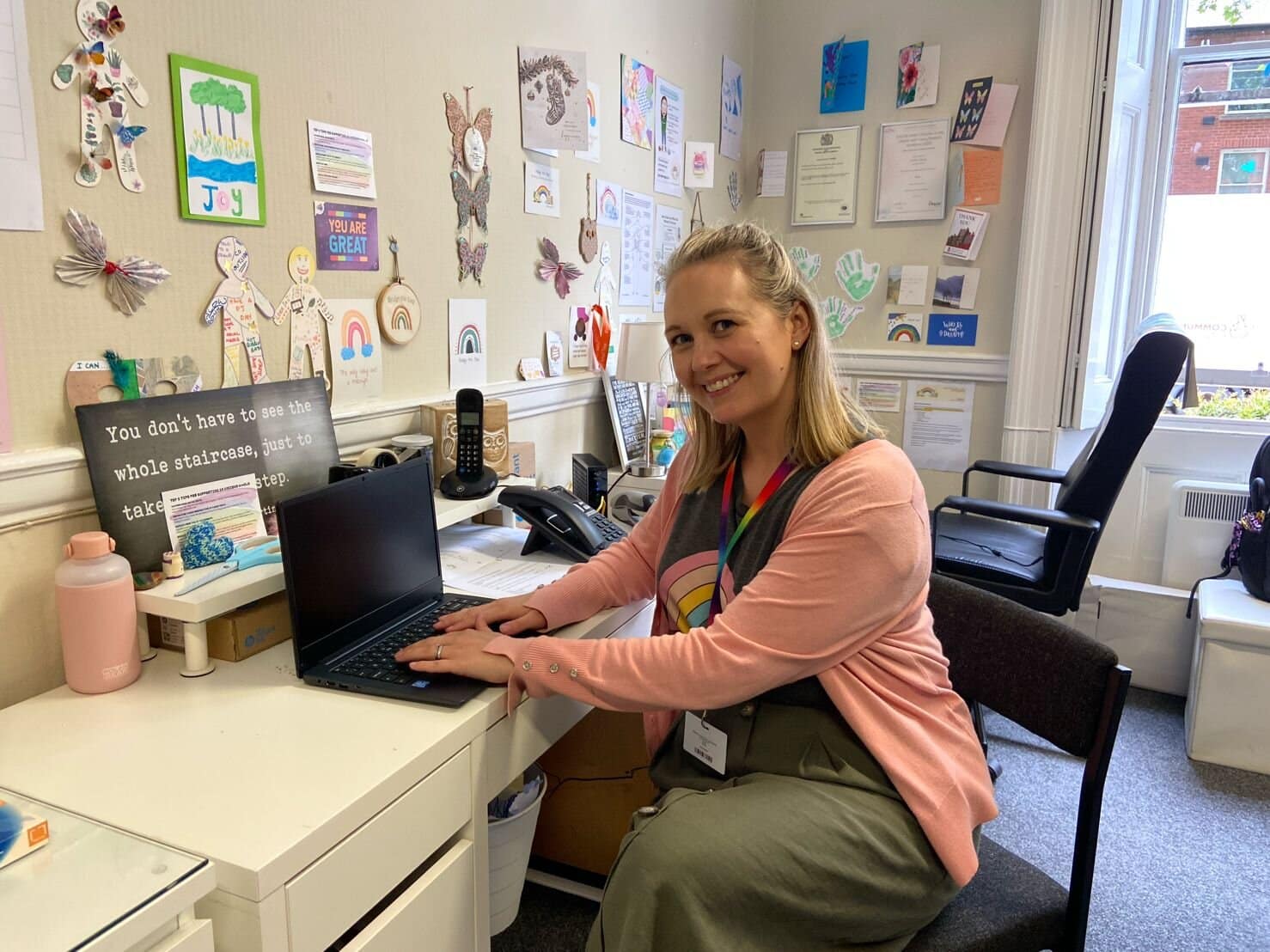 Jennifer Wyman, from Bridge the Gap is pictured with one of the laptops L.E.A.D IT donated.
