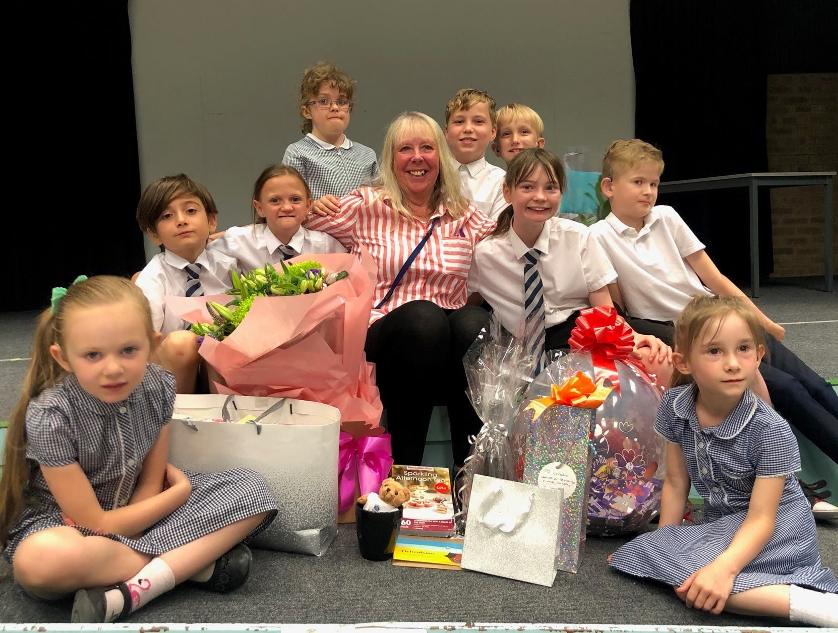 LInda Vessey is pictured with pupils from the Royal School for the Deaf Derby on her final day. Penguin PR: public relations, media and communications