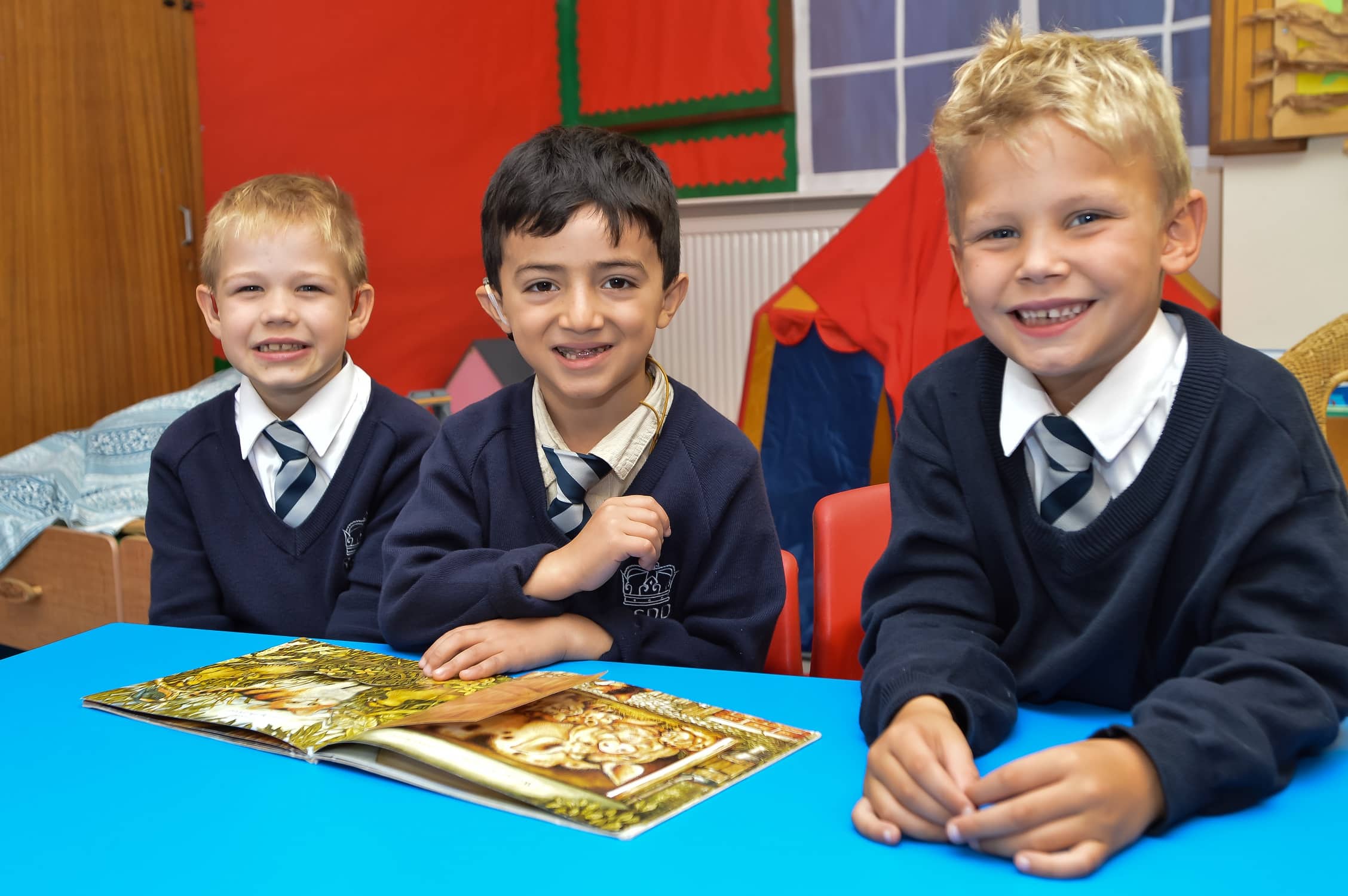 Lawand Hamadamin (centre) with fellow Royal School for the Deaf  pupils Rainers Askolskis and Rylee White. Penguin PR: public relations, communications and media.