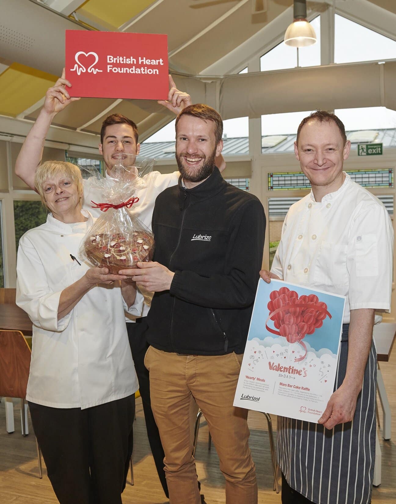 Lubrizol's caterin team with Will Durkin who won the cake.jpg