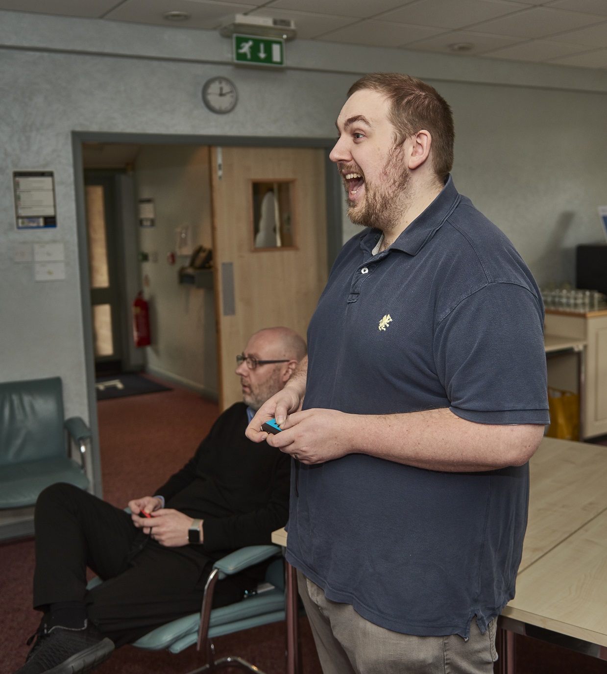 Lubrizol software systems engineer Graham Marshall, left, and IS specialist John Filipowicz take part in the company’s computer games contest in aid of the British Heart Foundation.  Penguin PR: media, public relations and communications.
