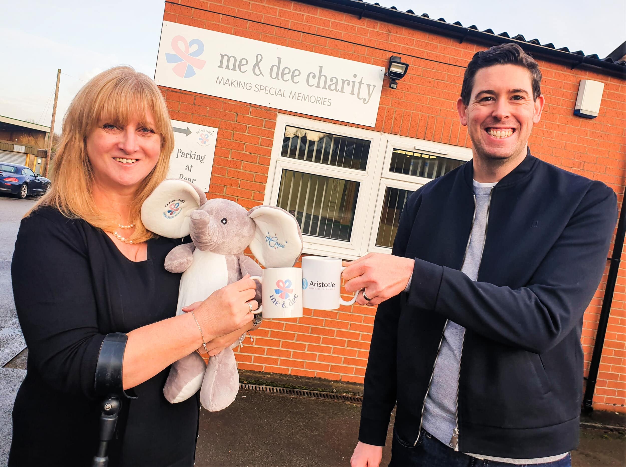 Maria Hanson, founder of Derbyshire charity me&amp;dee, and James Wallis, founder of Aristotle Financial Planning, raise a toast to next year, after James agreed to make me&amp;dee his charity of the year for 2021.