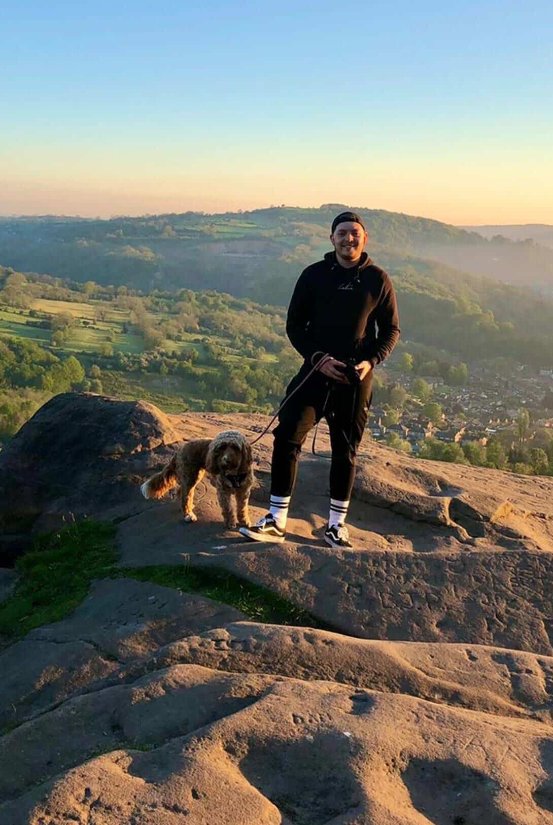 Mason Bell walking miles for MIND charity with family dog.