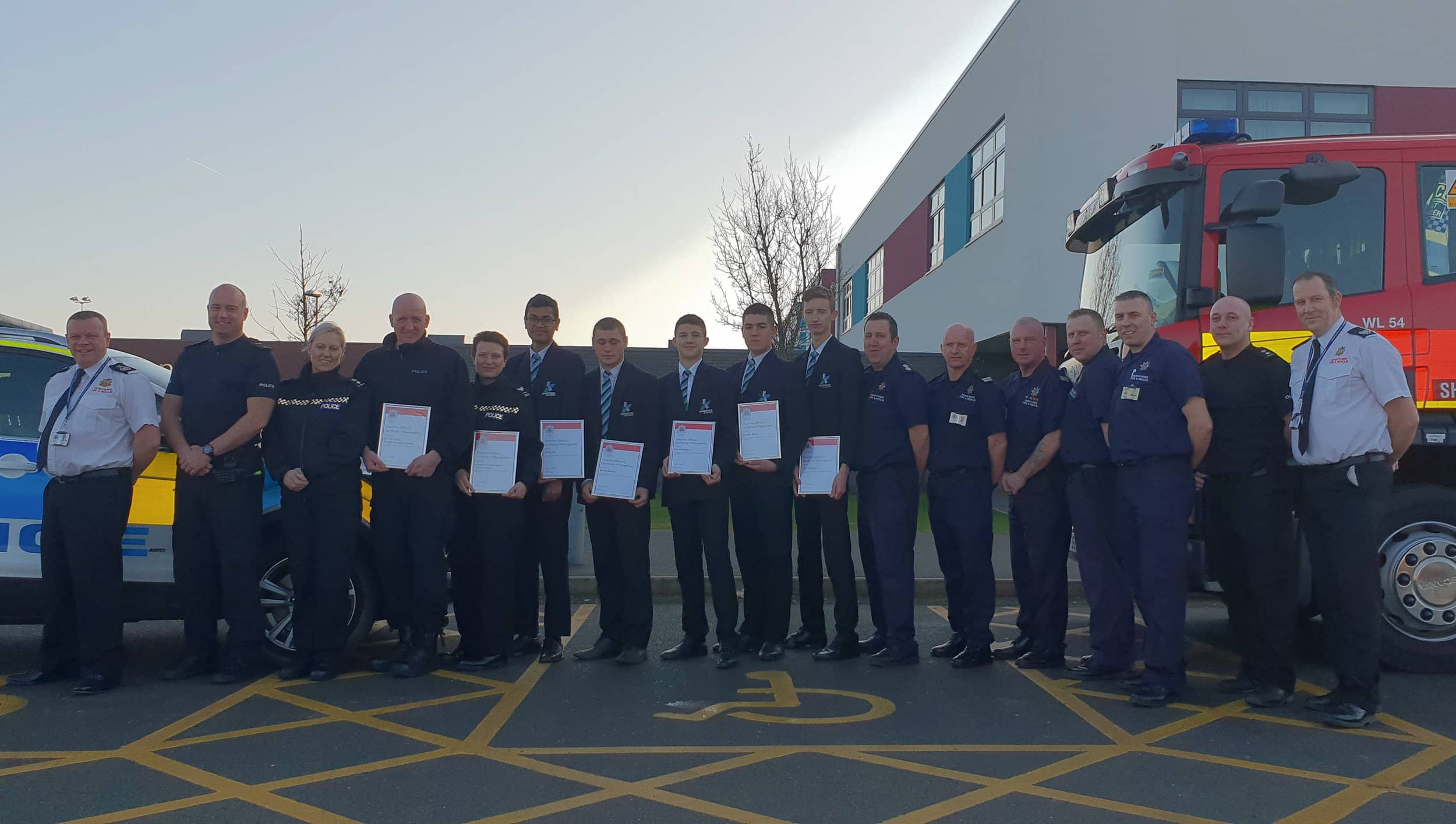 Members of the Derbyshire Police and Derbyshire Fire & Rescue Service with the five teenagers from Shirebrook Academy. Penguin PR: public relations, media and communications.