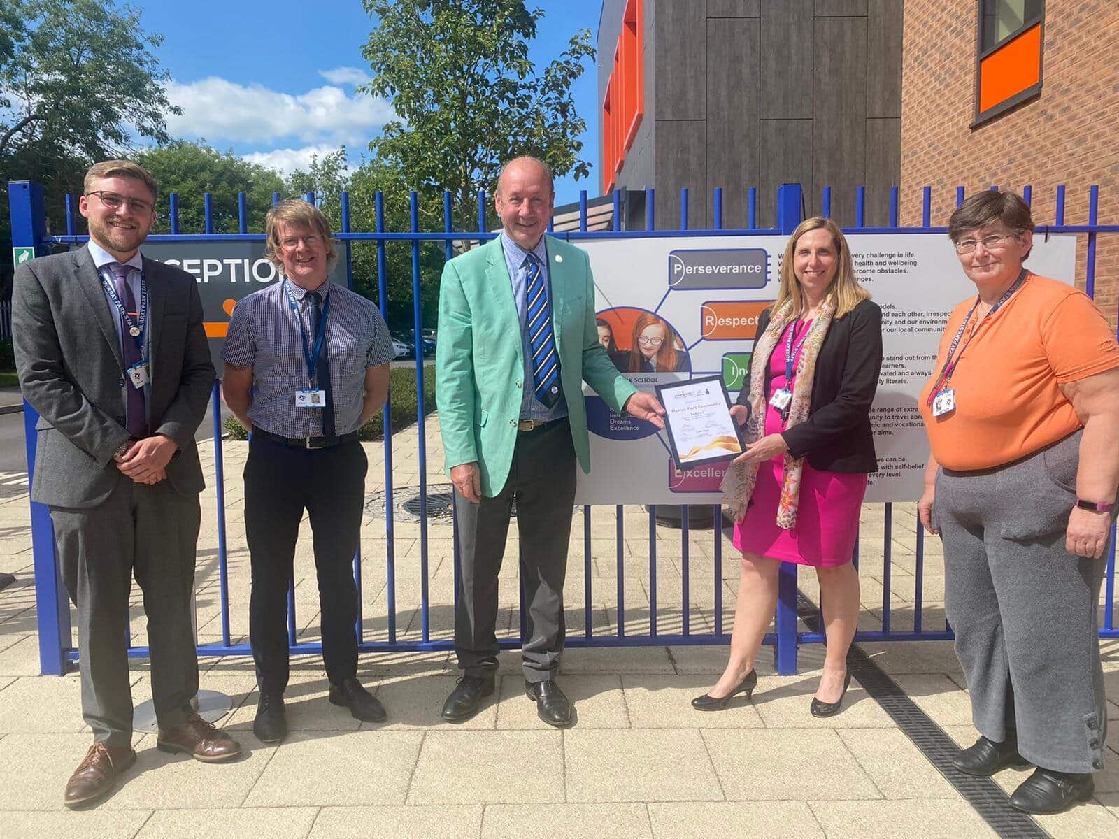 From left, Assistant head George Hagen, head of arts Simon Moore, Deputy Lord Lieutenant of Derbyshire Brell Ewart, head teacher Nicola Caley, deputy head Rebecca Somes.