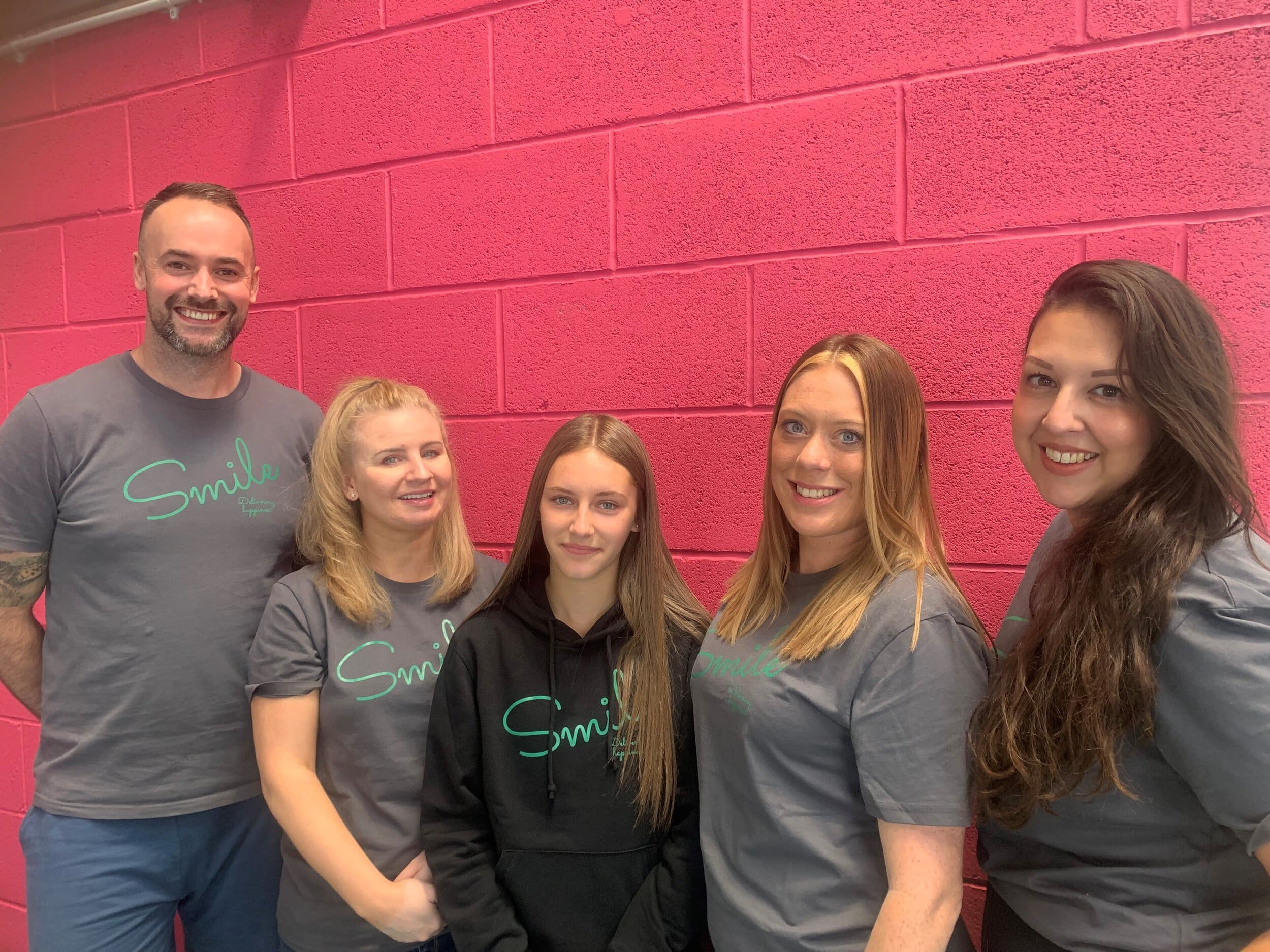 Colleague Box founders Adam and Natalie Bamford, with new team members.