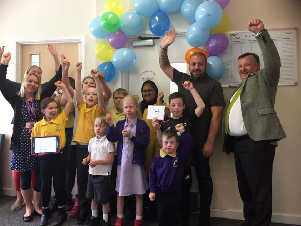 Pupils celebrate the opening of the brand-new Learning Kitchen at St Giles School in Derby. Penguin PR: public relations, press, media and communications