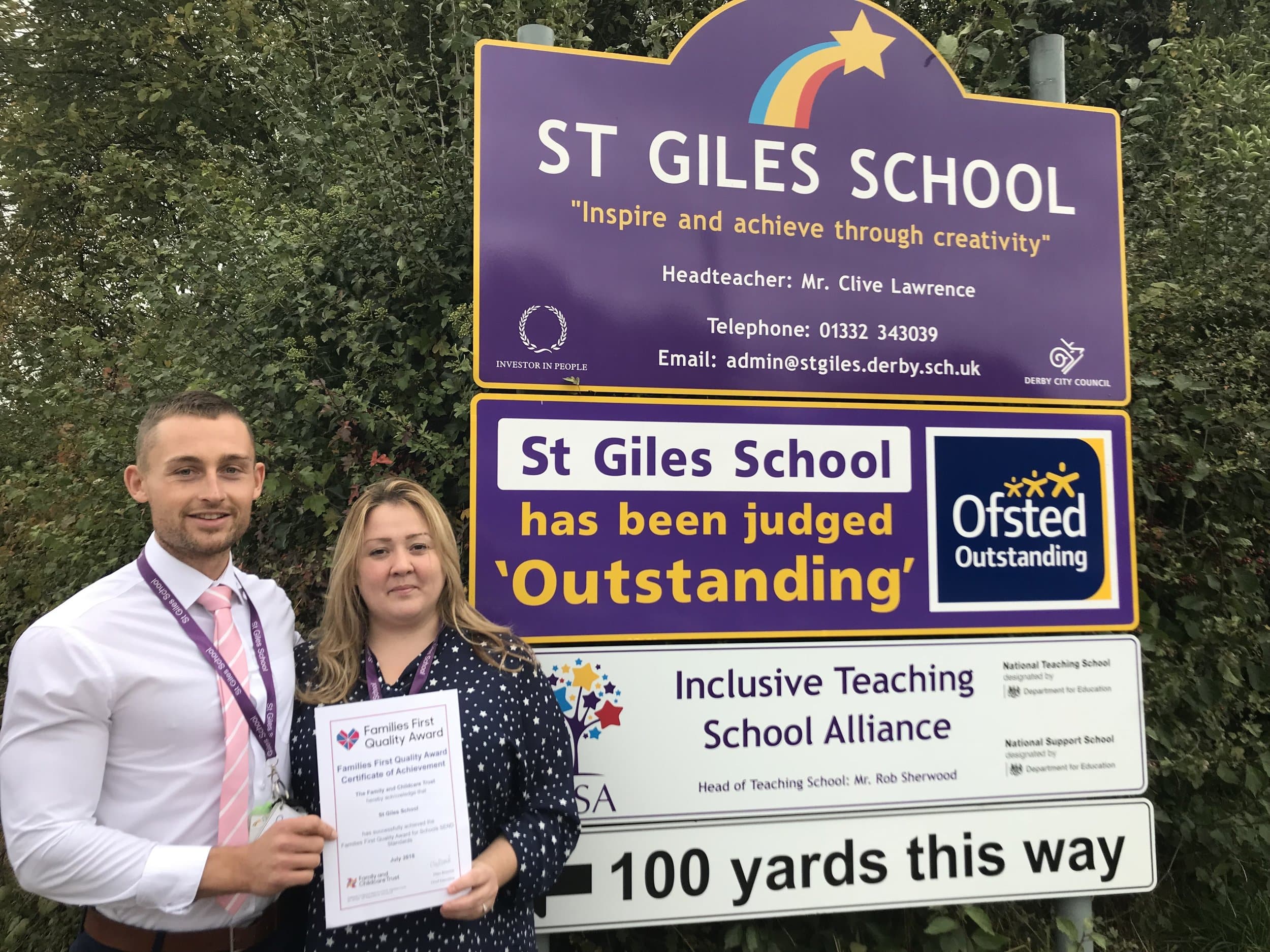 Sam Pryor and Fiona Hallam are pictured outside St Giles School in Derby with their Family First Award. Penguin PR: public relations, media and communications