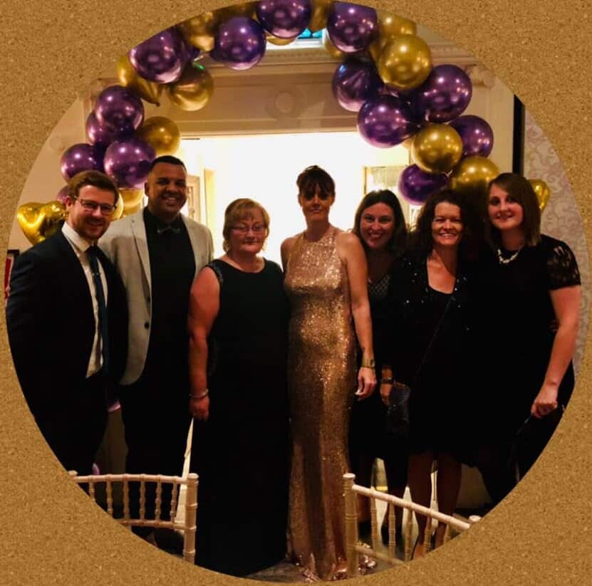 Staff from Derby special school St Giles with charity ball organiser - and parent - Anita Morrison (centre)