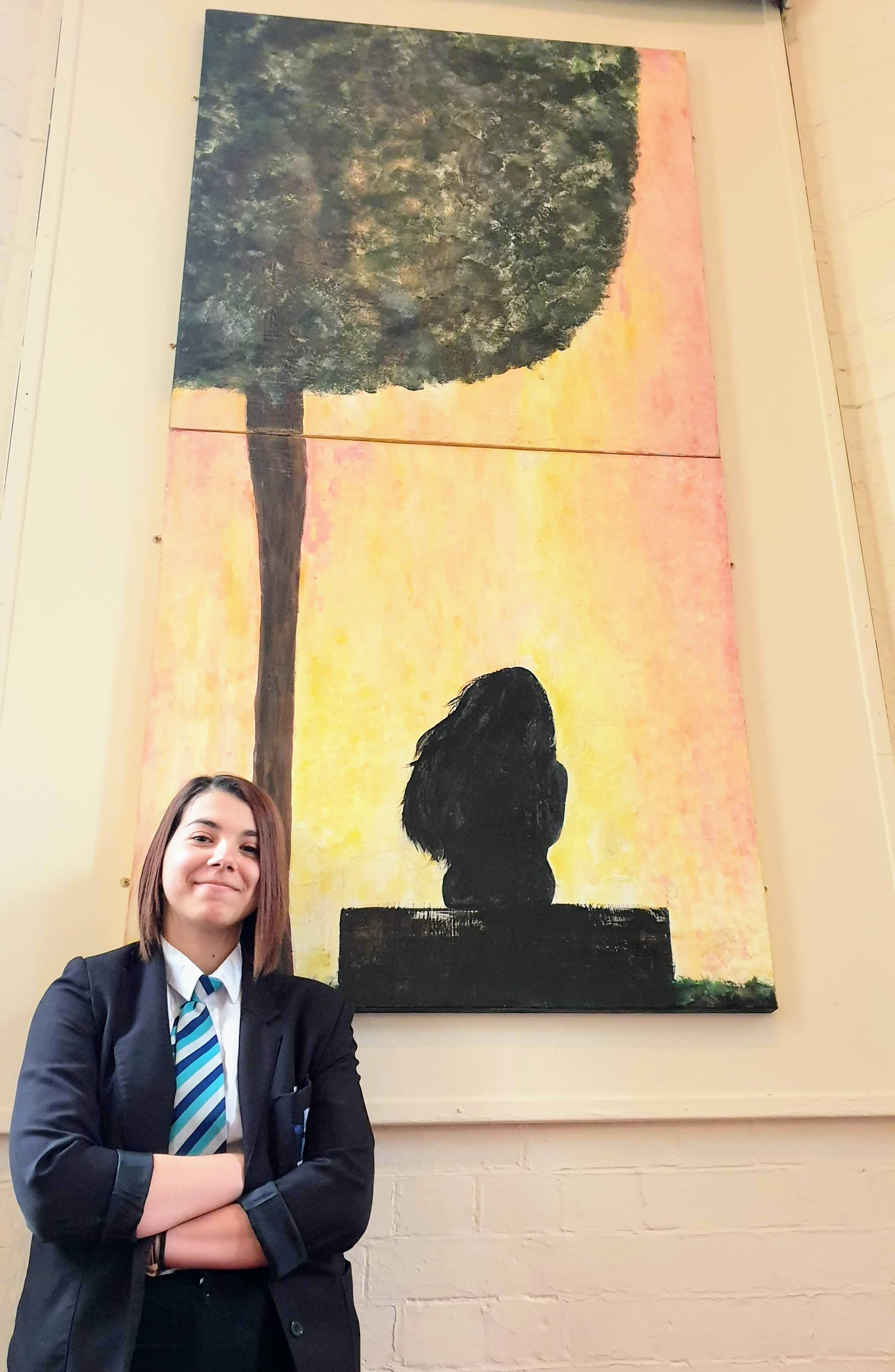 Student Ilona Esanu, 15, who attends Shirebrook Academy, has designed a new painting which has been given pride of place on the wall of Shirebrook’s cemetery chapel as part of a restoration project. Penguin PR: public relations, media and communicat…