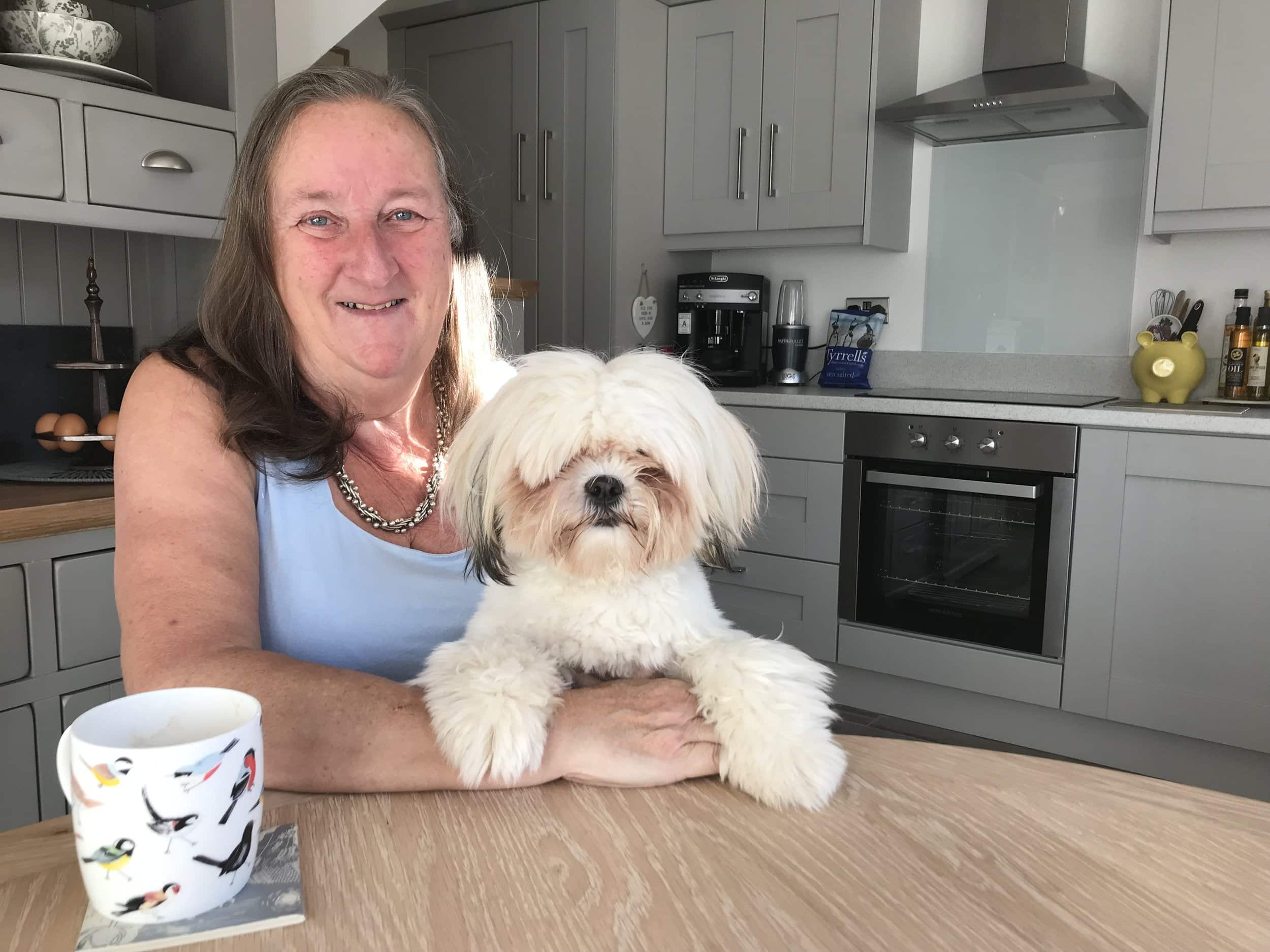 Susan King is pictured with her dog, Moppett. Penguin PR: public relations, media and communications