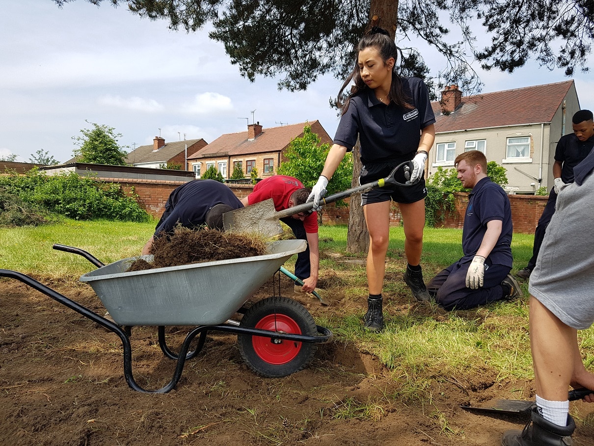 Toyota apprentices helped to create a garden at Kingsmead School. Penguin PR - public relations, media and communications