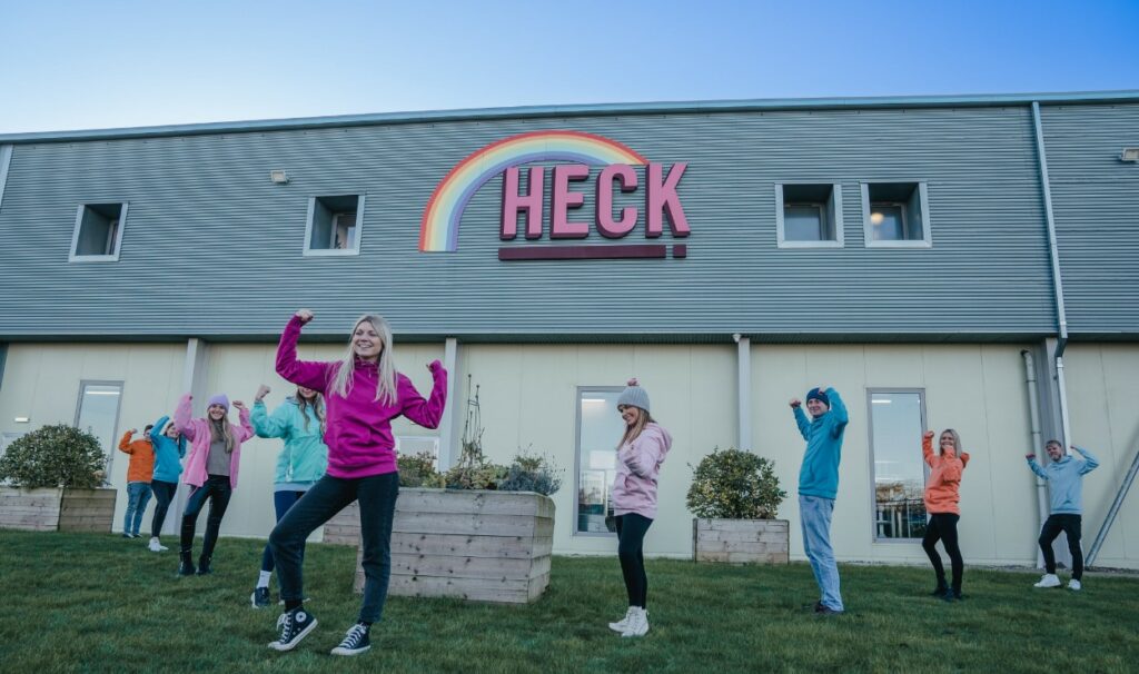 HECK employees outside their offices