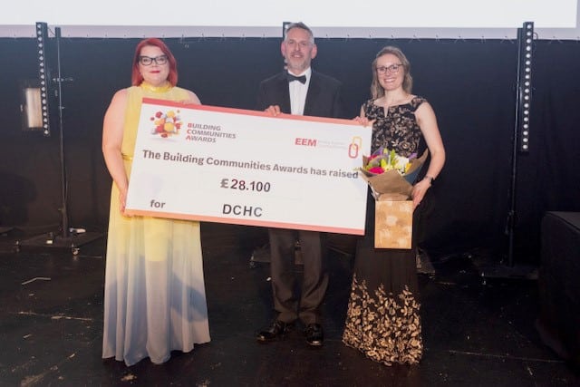 Joanna West, trustee of the Derbyshire Children’s Holiday Centre, receiving the cheque for £28,100 from Niall Clark, vice chair of EEM and Rebecca Dermody-Simmons, chief executive of EEM