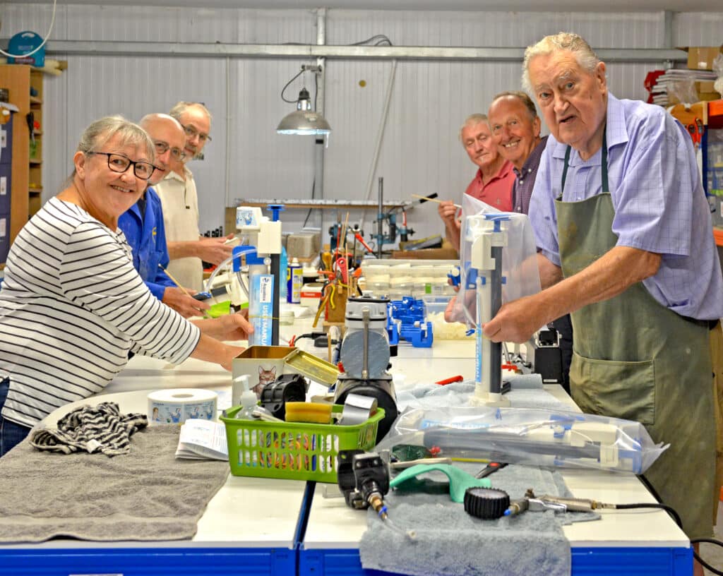 The Aquabox team working on the assembly line