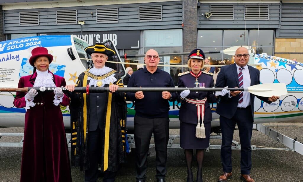 Derby granddad Vic Handley with the boat he will row as part of the World's Toughest Race Atlantic and Derby VIPs Theresa Peltier, Derby Mayor Cllr Alan Graves, Cllr Baggy Shanker and Lord-Lieutenant of Derbyshire Elizabeth Fothergill.