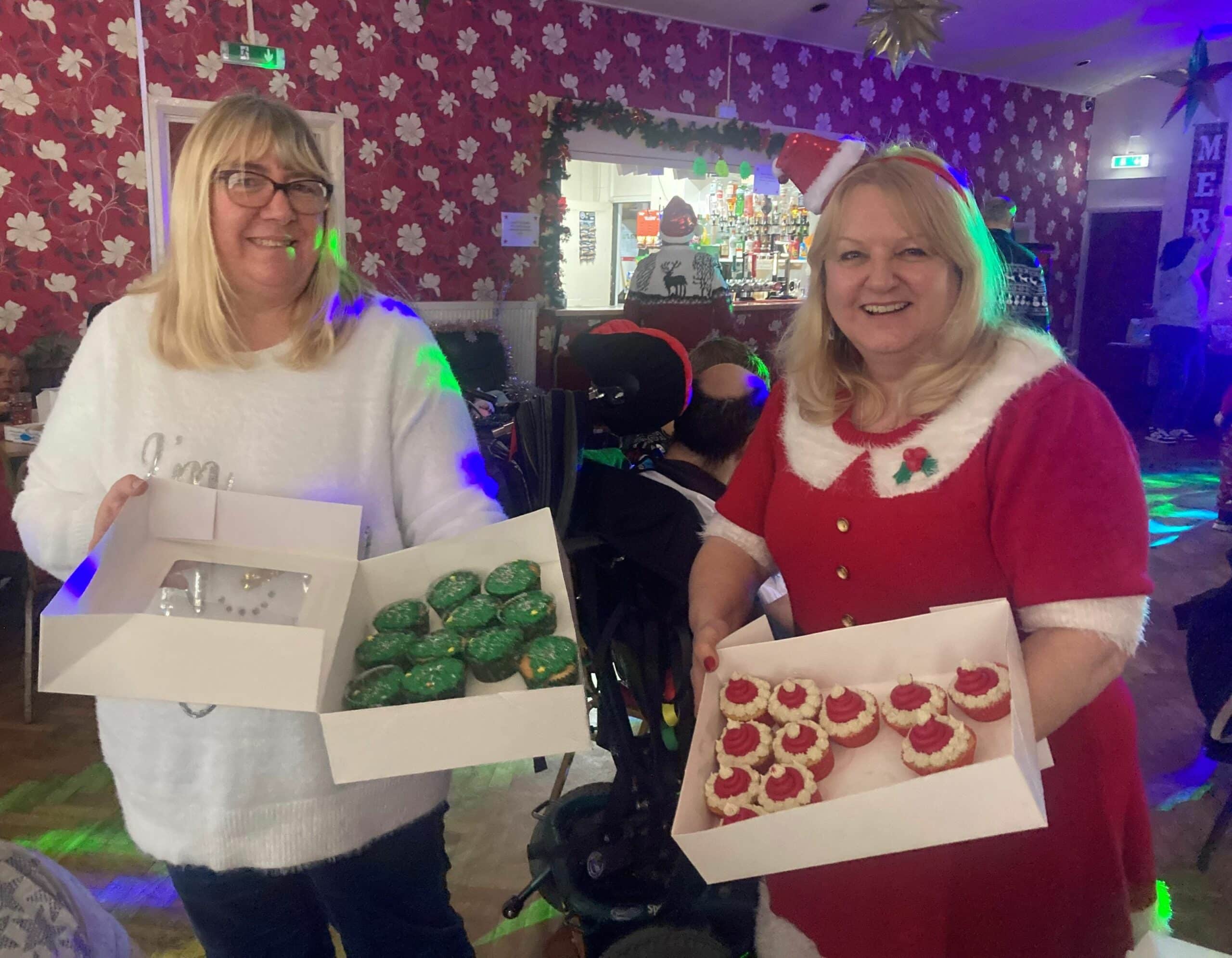 Jo Pursglove and Debbie Smith with cakes donated by Derbyshire science company Lubrizol