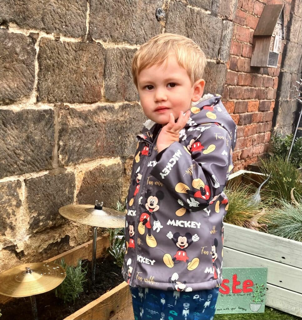 Theo enjoying the new sensory garden in Milford