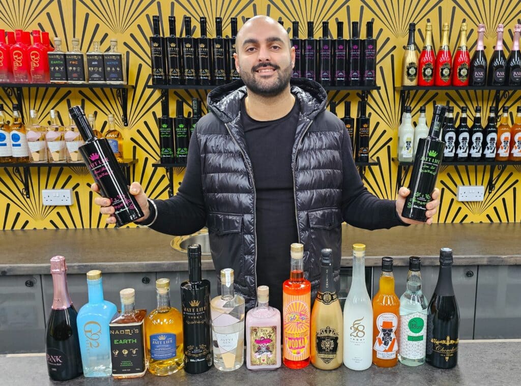 Independent drinks startup Virtus Brands founder Baz Kooner with some of his company's bottles.