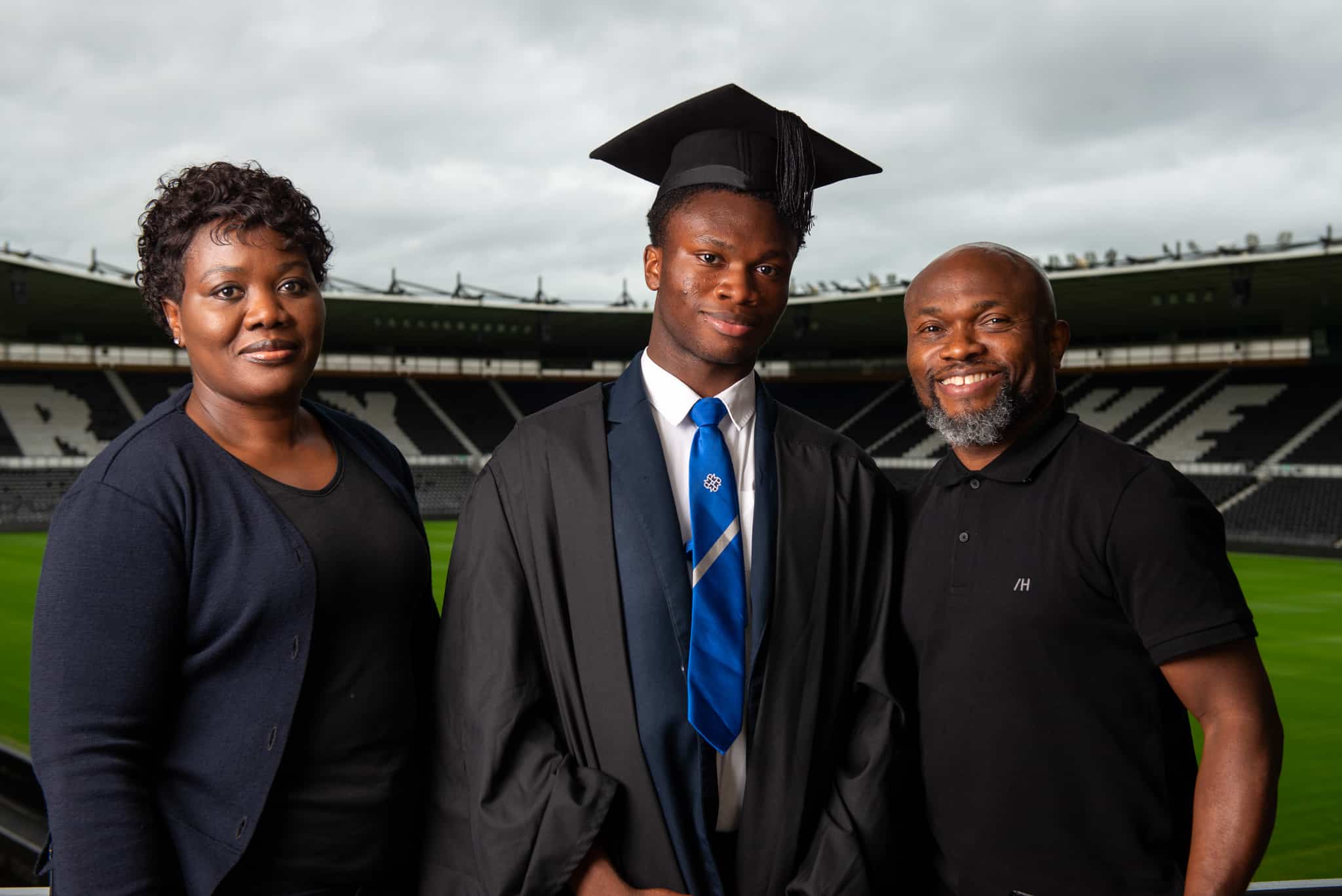 Murray Park student Bolu Shofowoke (centre), with proud parents on the night Dola and Tunde Shofowoke
