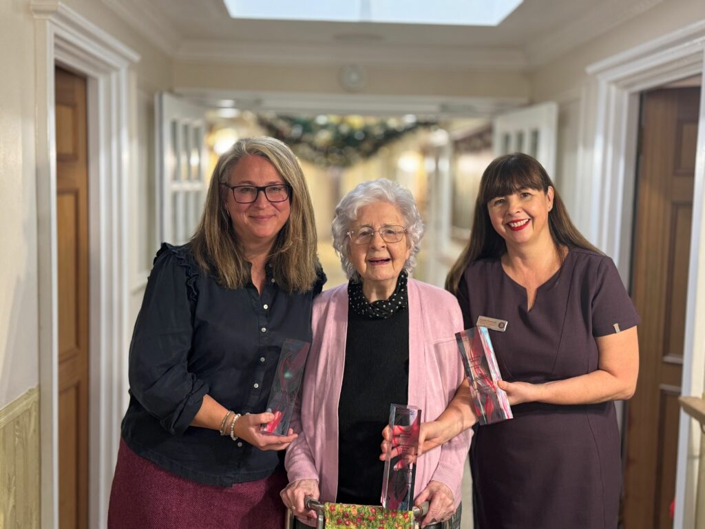 Celeste Turner and Lucille Parsisson from Derby's Brookfields Nursing Home with 95-year-old resident Muriel Davis