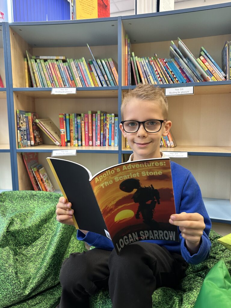 Logan, 7, has won a short-story writing competition and published his own book.