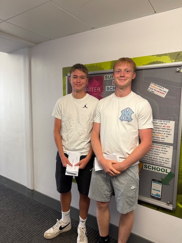 l-r Reuben Whitby and Kaiden Ramsay with their A-Level results at Allestree Woodlands School