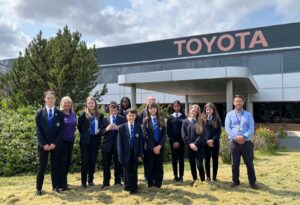 Pupils and careers lead Tim Taylor from Murray Park School at Toyota, Burnaston