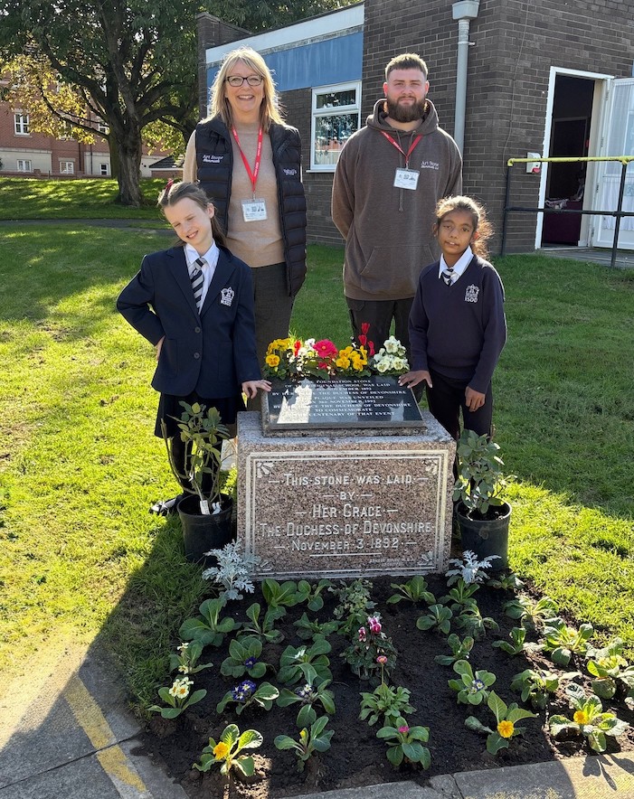 Helen Wathall and Reece Marsh from Art Stone Memorial with pupils from Royal School for the Deaf
