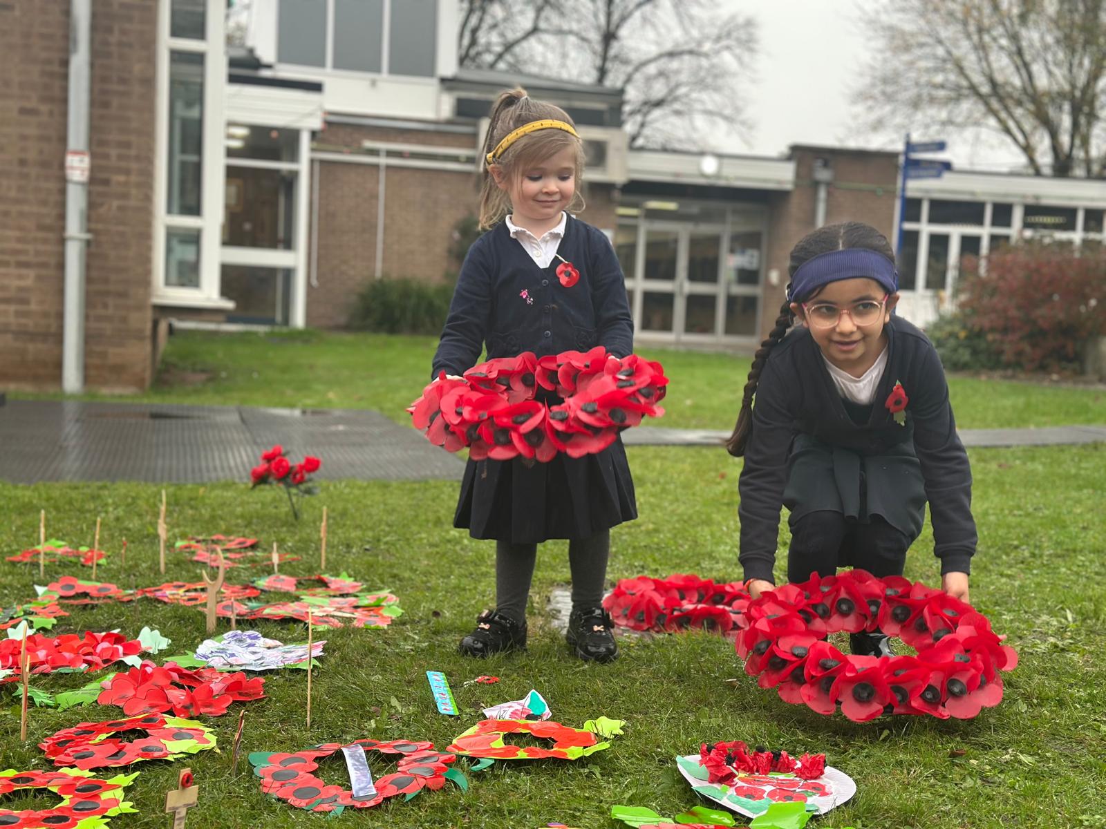 Children laid handmade wreaths and crosses for Remembrance Day at Royal School for the Deaf
