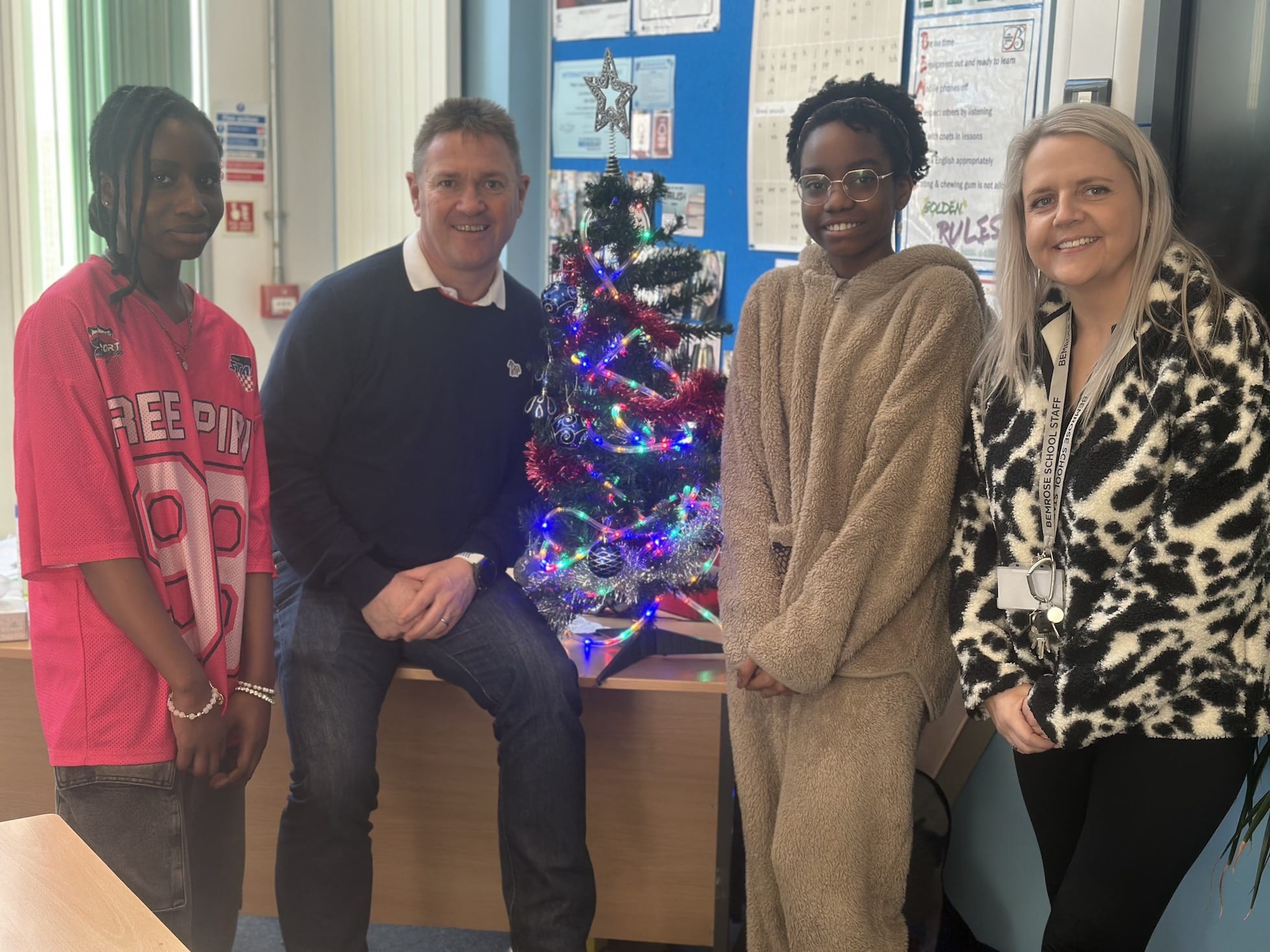 Pupils from The Bemrose School with headteacher Neil Wilkinson and DSL Beccy Broderick on dress down day which raised £1000 for the MacMillan ward.