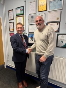 The Bemrose School headteacher Neil Wilkinson with managing director of Derventio Education, Stuart Reece