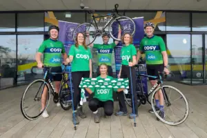 Participants outside Derby Arena for the Cosy Bike and Hike charity challenge in Derbyshire