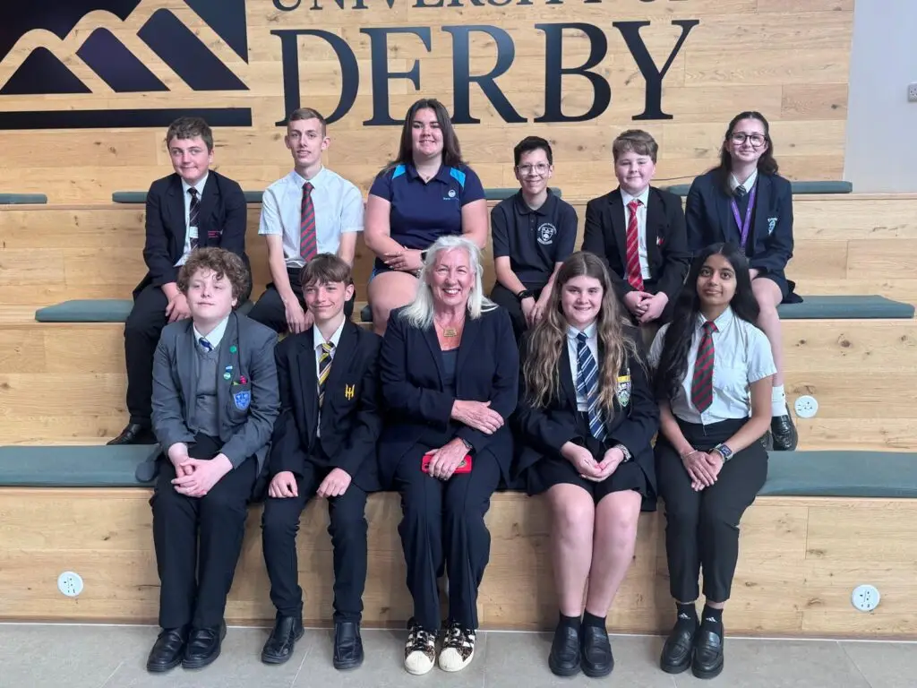 Former Government minister Amanda Solloway poses with student representatives from The Two Counties Trust at the University of Derby during the Trust's Student Conference.