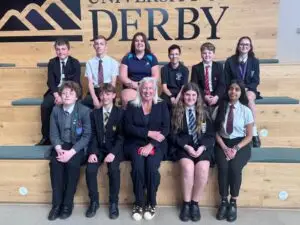 Former Government minister Amanda Solloway poses with student representatives from The Two Counties Trust at the University of Derby during the Trust's Student Conference.