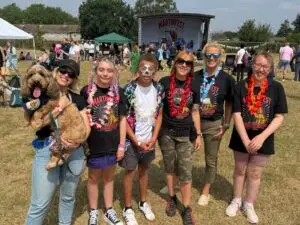 Staff and students dressed in their MartinFest merchandise to celebrate the special day, with school therapy dog Martin joining in the fun