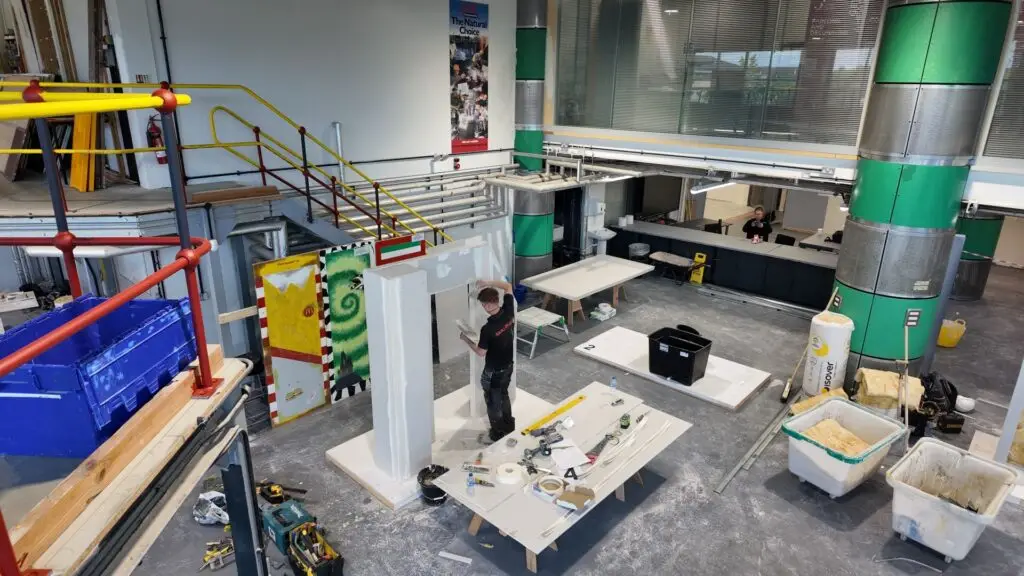 Harrison Priestley works on his drylining competition entry during the SkillBuild Regional Finals at Dudley Construction Apprentice Training Centre.
