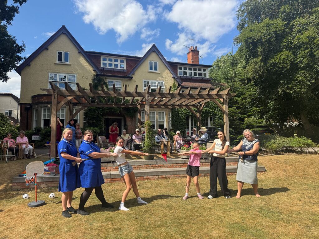 Staff, families and residents at Brookfields Private Nursing Home having fun at their sports day