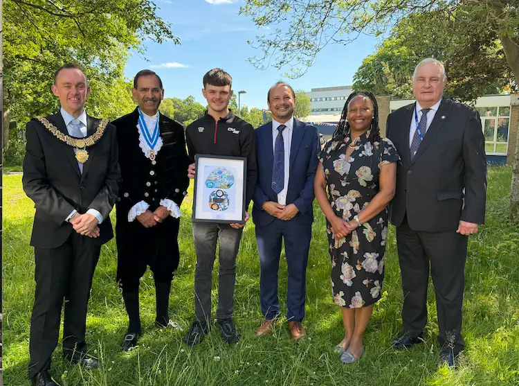 Deaf racing driver Caleb Mcuff inspires pupils at RSDD